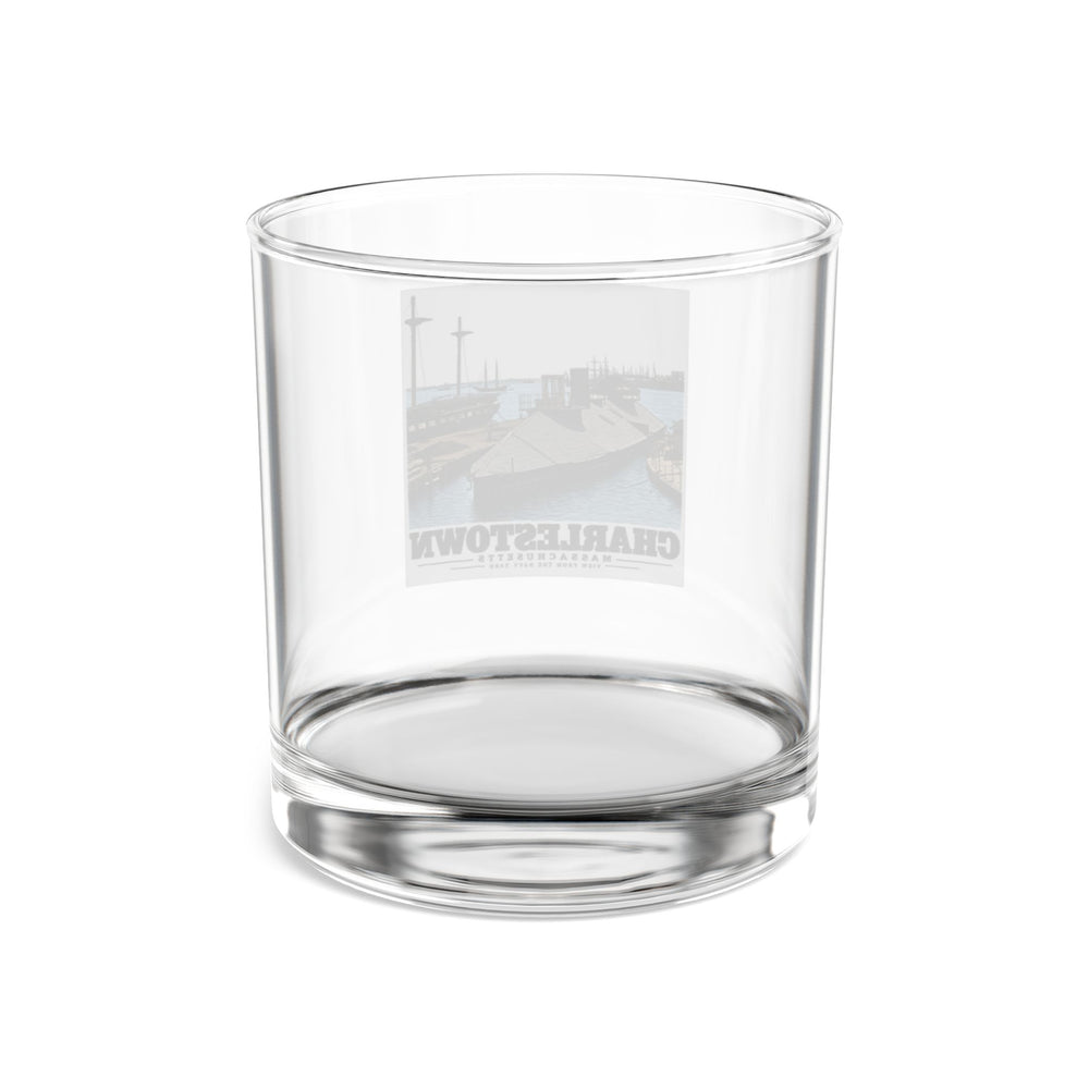 Rear of clear rocks glass showing reversed Navy Yard waterfront artwork through glass