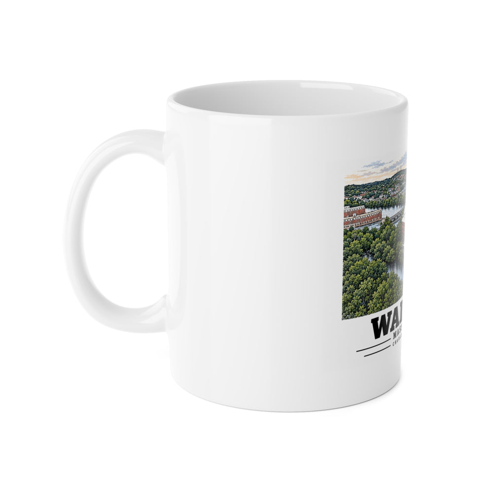 Left-handle view of the white ceramic mug with Charles River Museum artwork partly visible.
