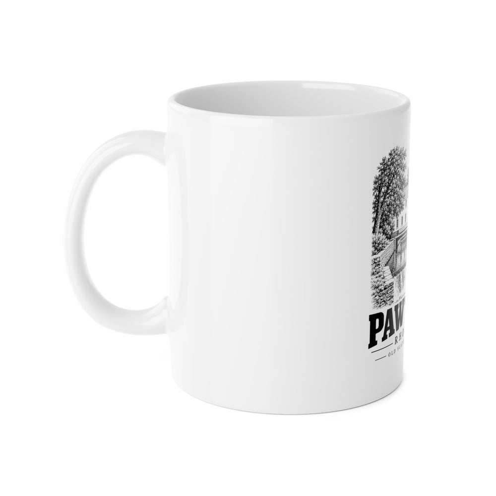 Left side of Pawtucket Old Slater Mill and Raceway ceramic mug showing the handle and edge of the print