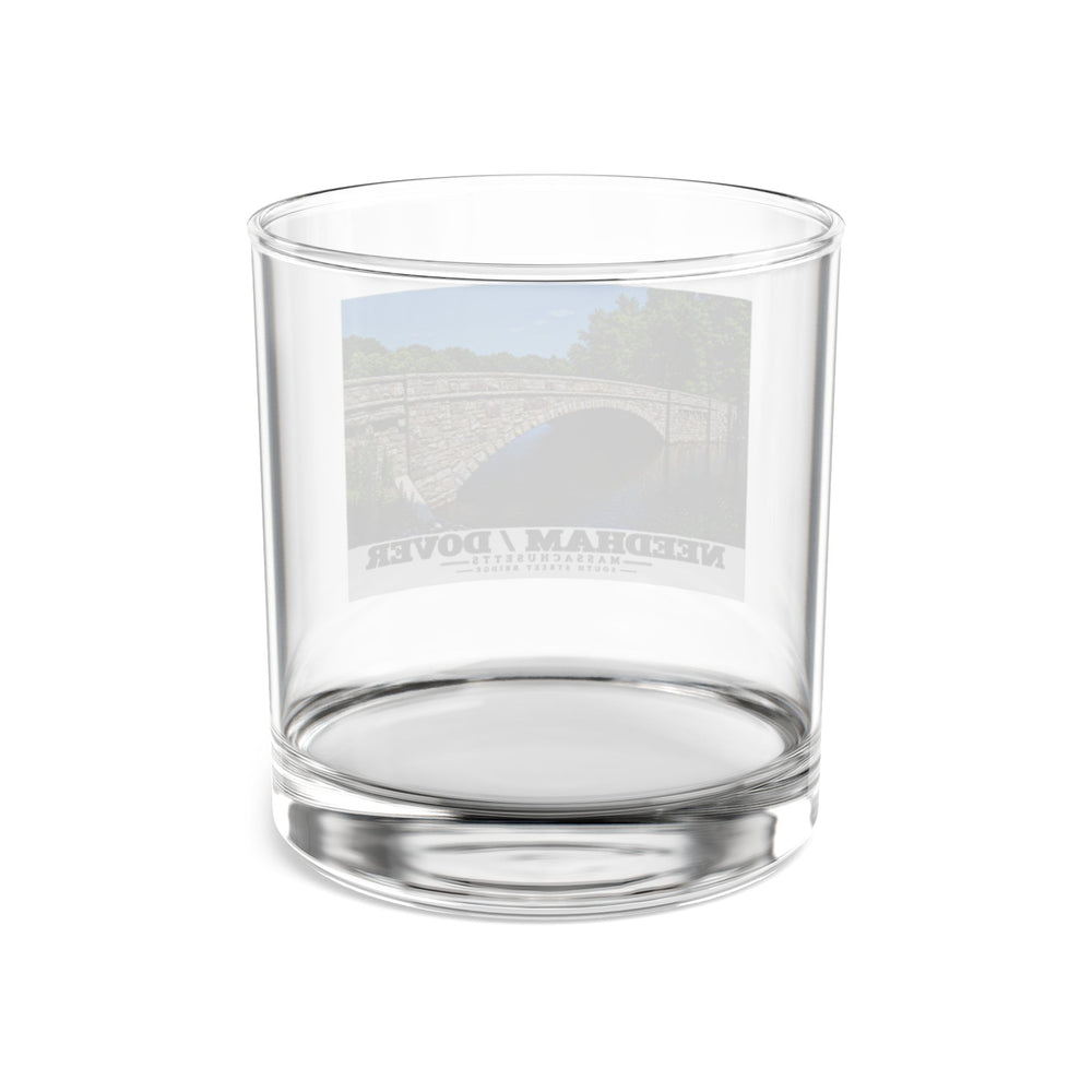 Rear view of clear rocks glass with South Street Bridge stone arch and river print and reversed lettering visible through the glass