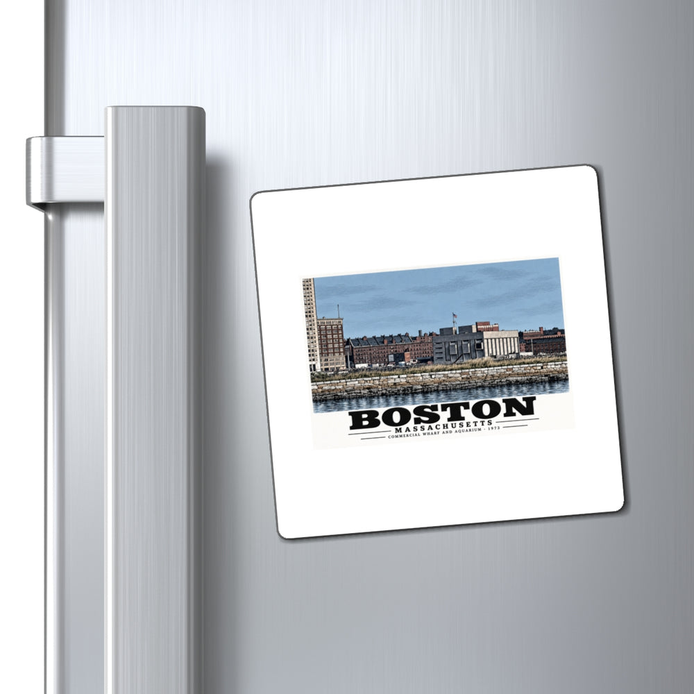 Commercial Wharf and Aquarium waterfront buildings, stone seawall and harbor water magnet on a refrigerator beside its handle