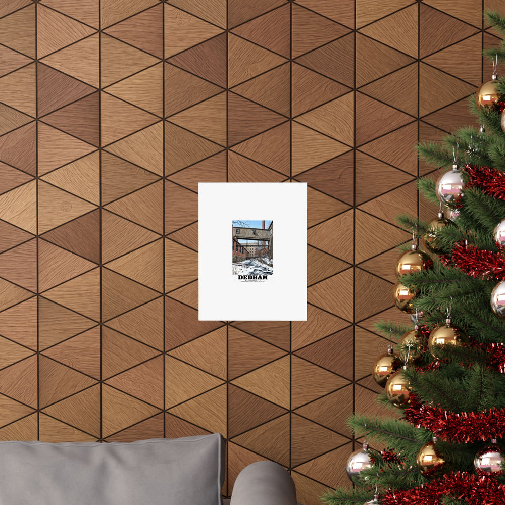 Dedham Norfolk Manufacturing Company Cotton Mill matte poster displayed above a sofa beside a decorated tree.