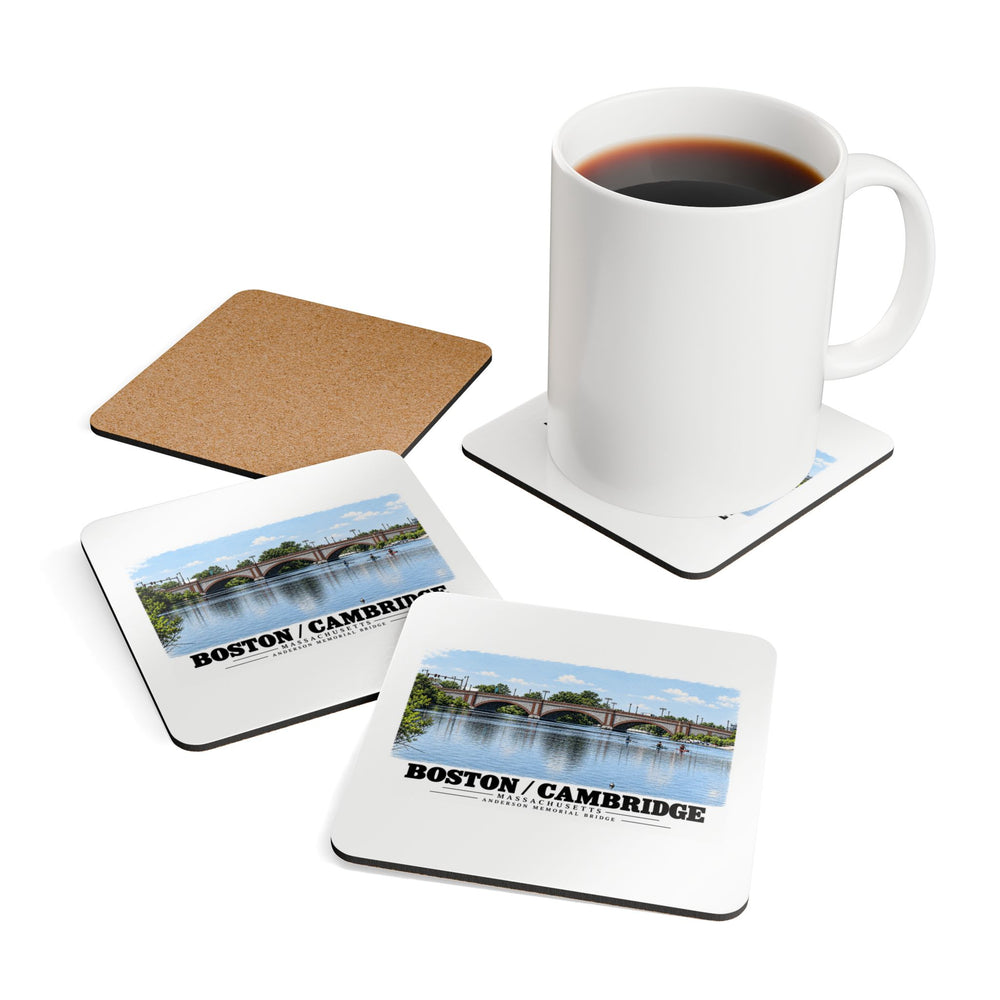 Coasters showing Anderson Memorial Bridge and scullers artwork beside a plain white mug of coffee and a coaster's cork reverse