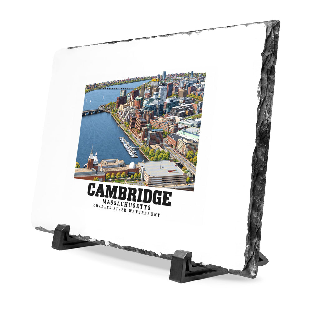 Angled rough-edged slate display on black stands showing Cambridge Charles River waterfront aerial city view artwork