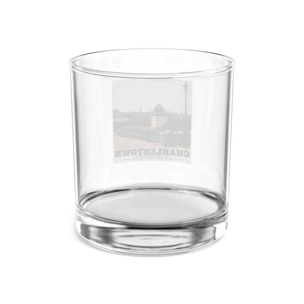 Rear of clear rocks glass showing reversed Water Battery artwork through glass