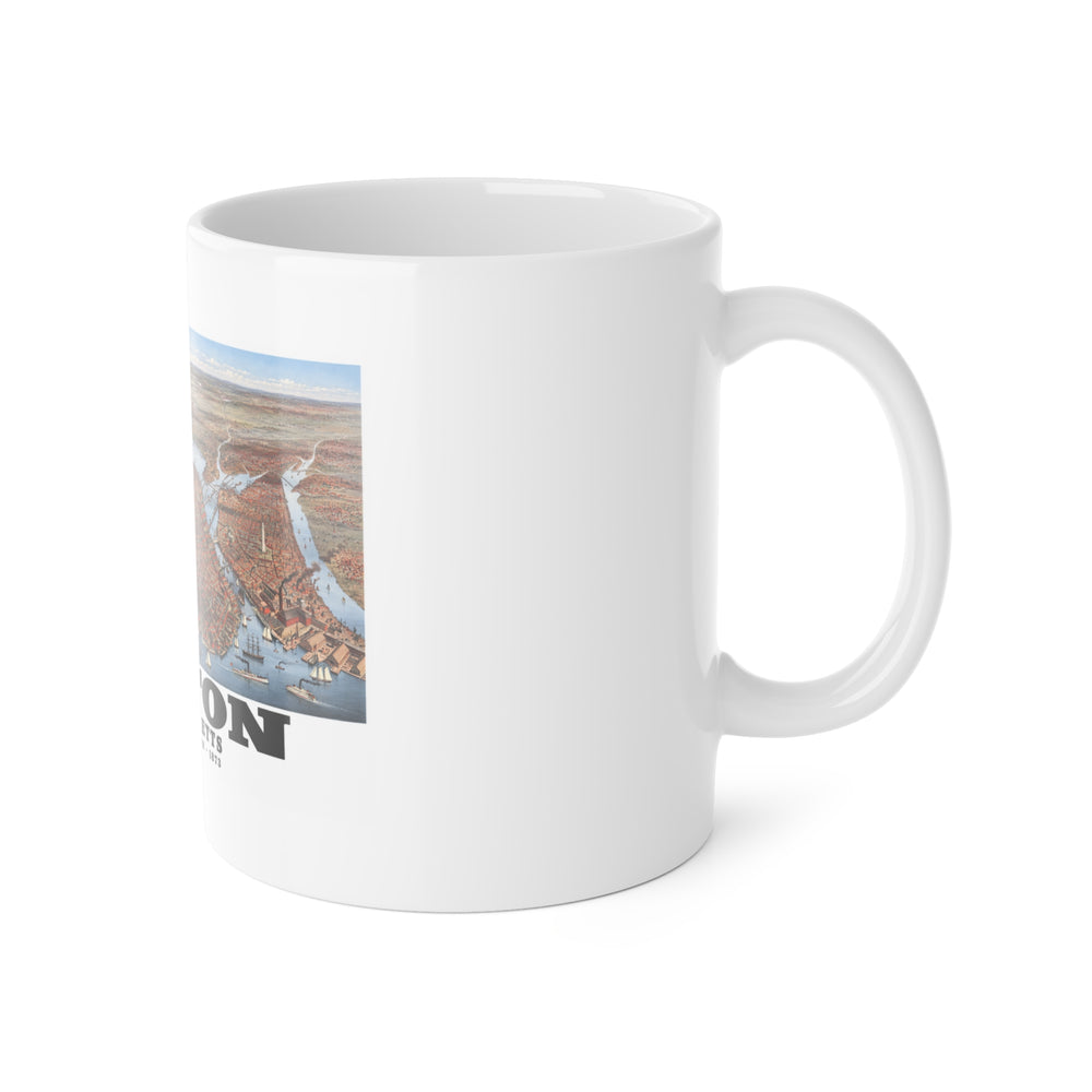 White mug with handle at right and part of the historic Boston city and waterways bird-eye panorama print at left