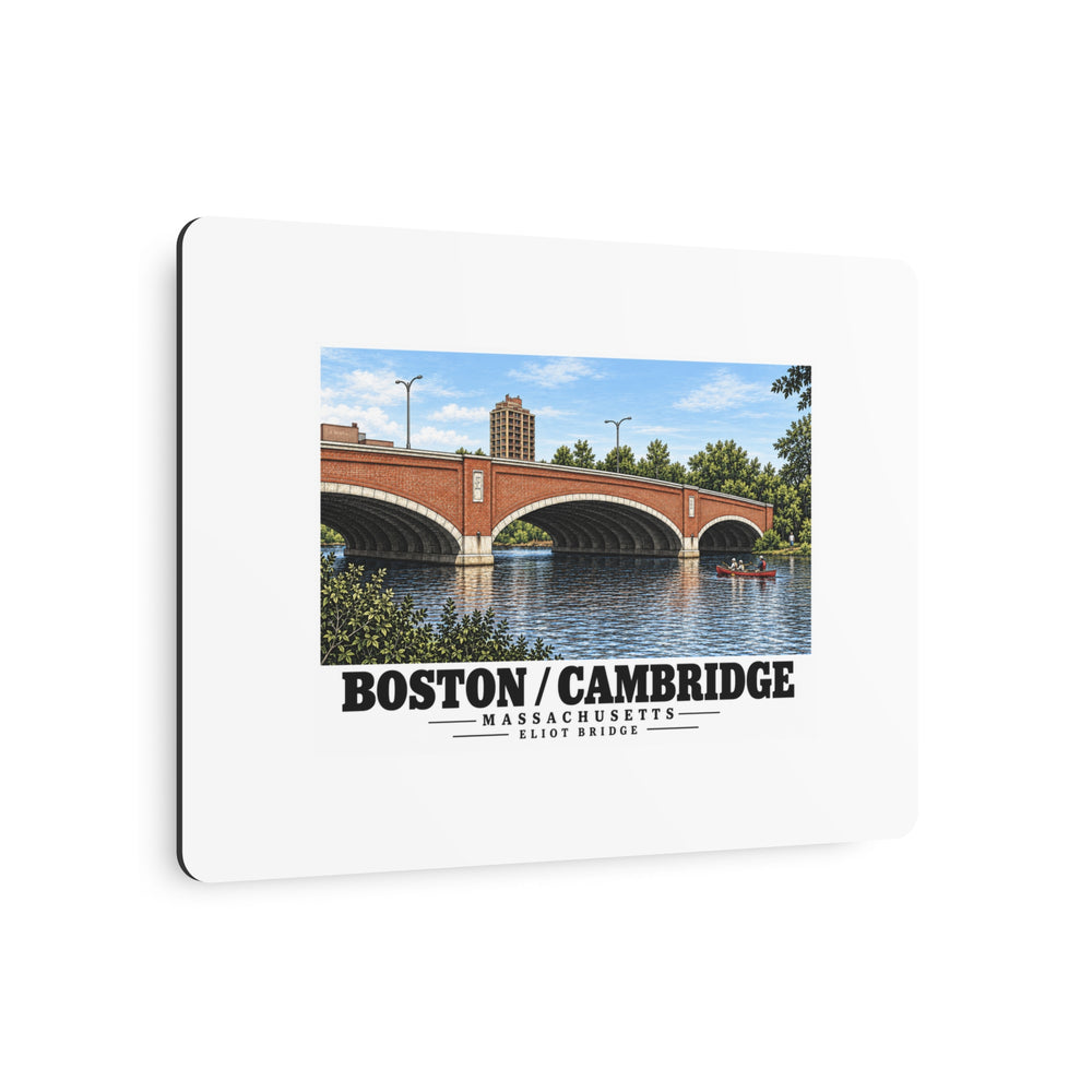 Angled view of Eliot Bridge red brick arches and boats metal print with its dark edge visible