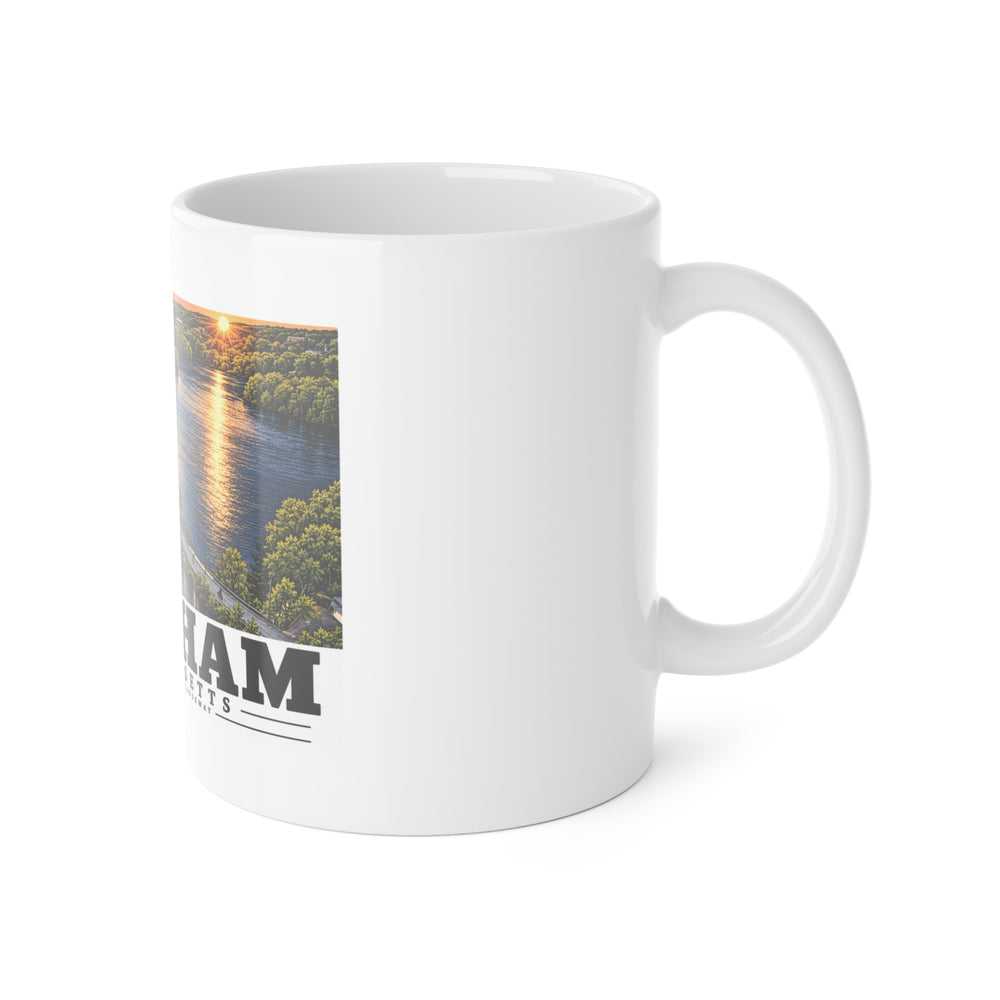 Right-handle view of the white ceramic mug with Forest Grove Road Causeway artwork partly visible.