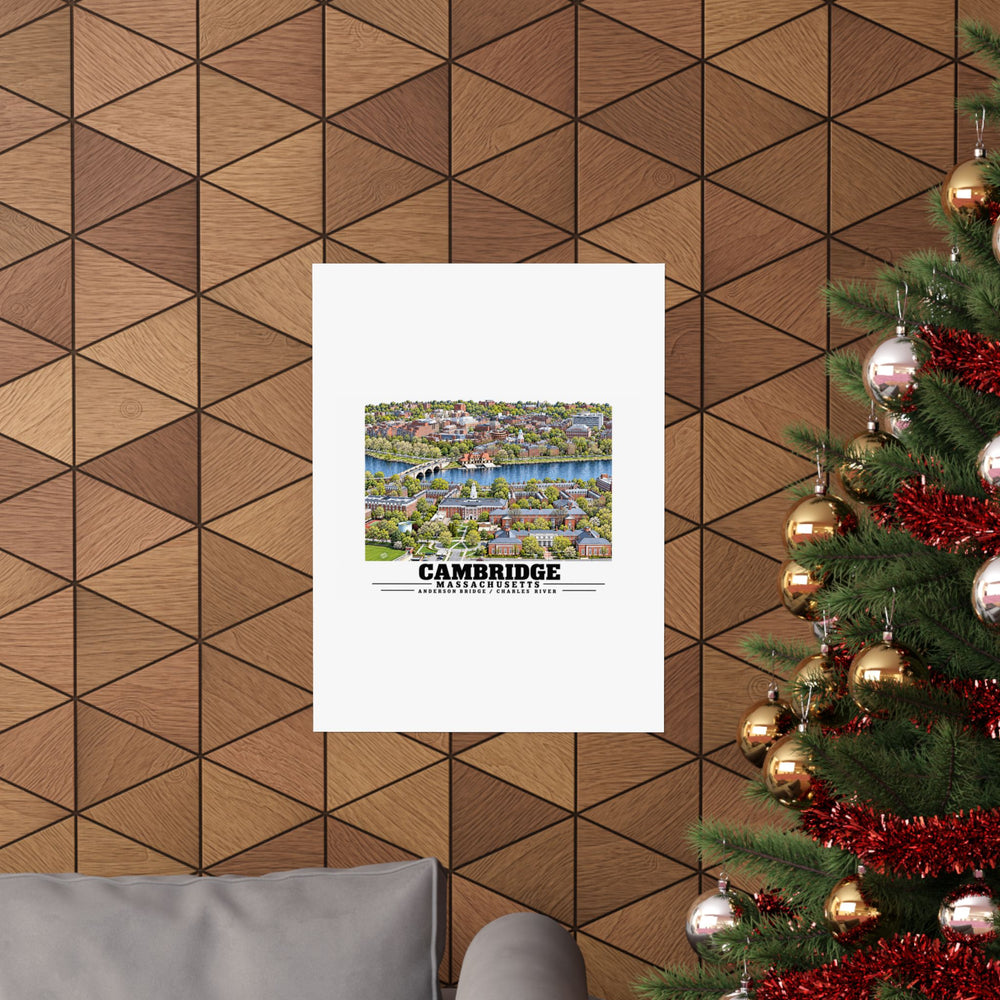 Cambridge and Charles River poster on a wood-patterned wall beside a decorated evergreen.