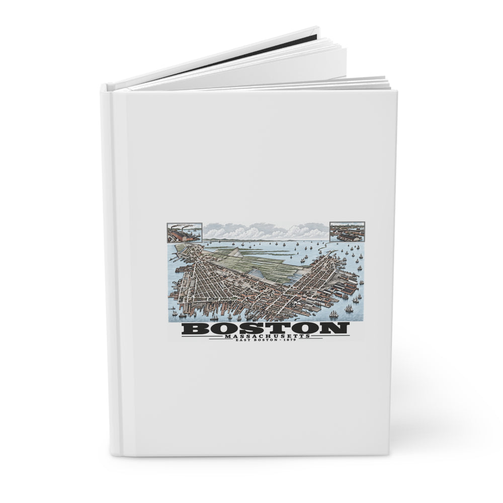 Partly opened white hardcover journal showing East Boston bird-eye city and harbor panorama with inset views artwork on the front