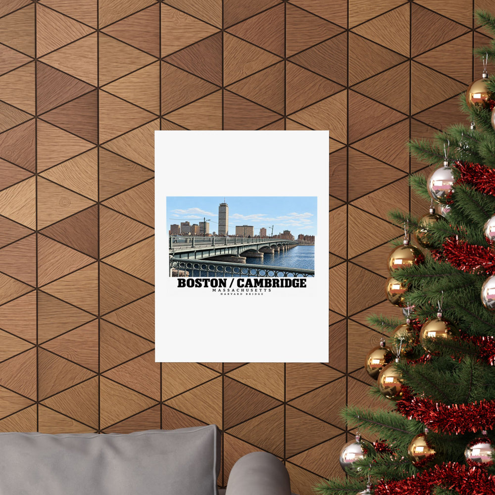 Poster with Harvard Bridge artwork and Boston/Cambridge lettering on a wood wall beside a decorated evergreen