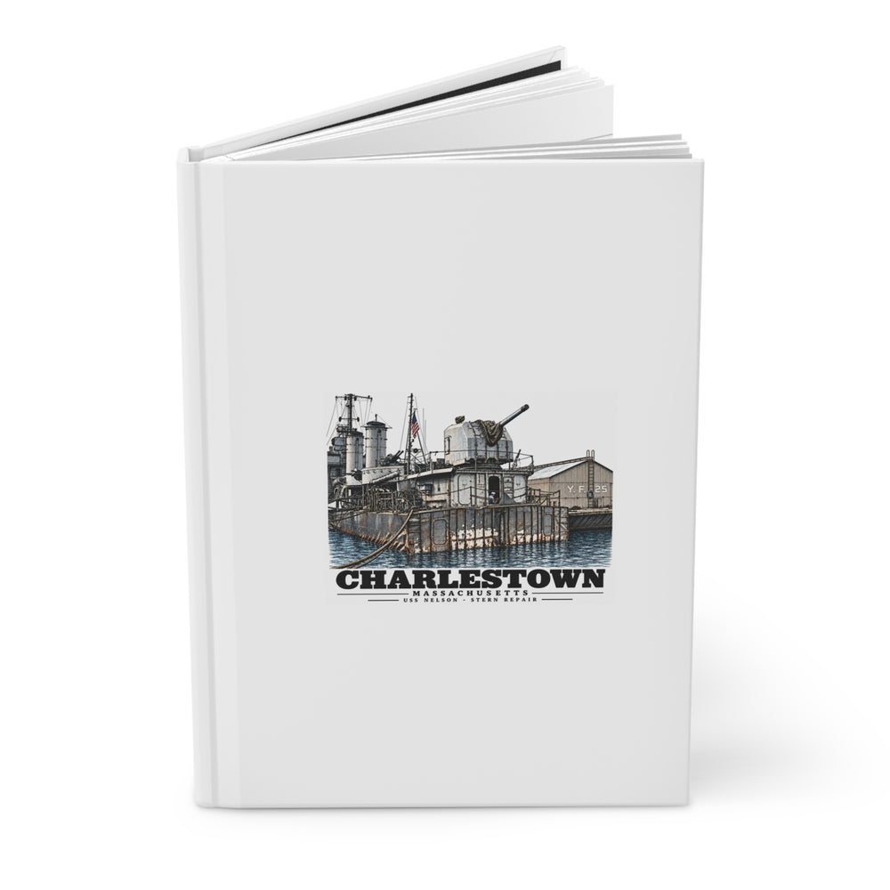 Partly open USS Nelson hardcover journal showing printed front cover