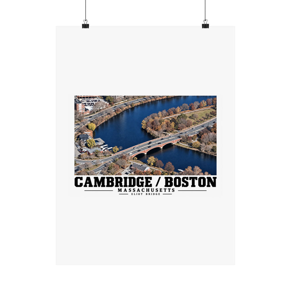 Eliot Bridge aerial river view poster with Cambridge/Boston lettering hanging from two binder clips