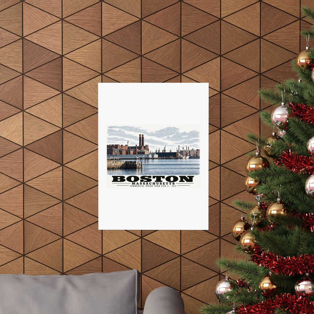 Commercial Wharf waterfront buildings, twin chimneys and harbor water poster on a wood wall beside a decorated evergreen