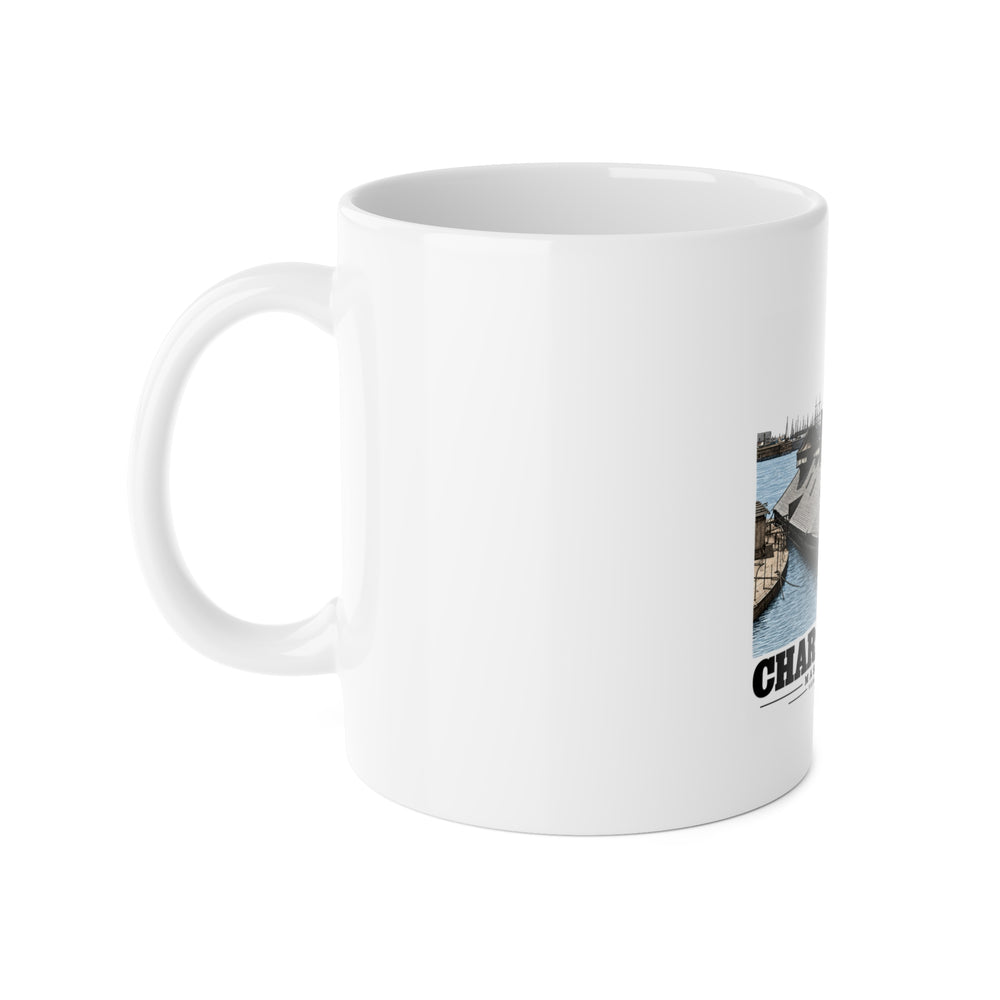 Left side of white ceramic mug showing handle and partial Navy Yard waterfront artwork