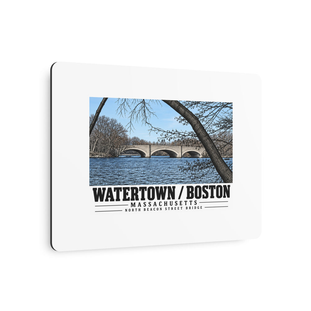 Angled view of North Beacon Street Bridge stone arches framed by a bare tree metal print with its dark edge visible