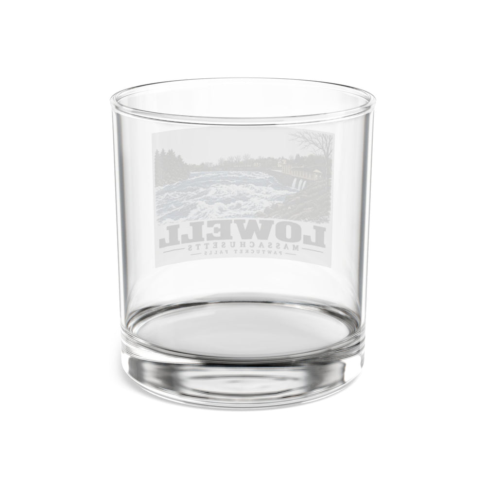 Transparent reverse of Pawtucket Falls rocks glass, with Lowell, Massachusetts artwork and lettering.