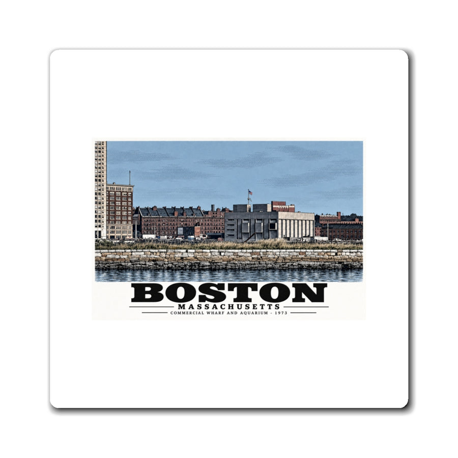 White rectangular magnet showing Commercial Wharf and Aquarium waterfront buildings, stone seawall and harbor water artwork and Boston lettering