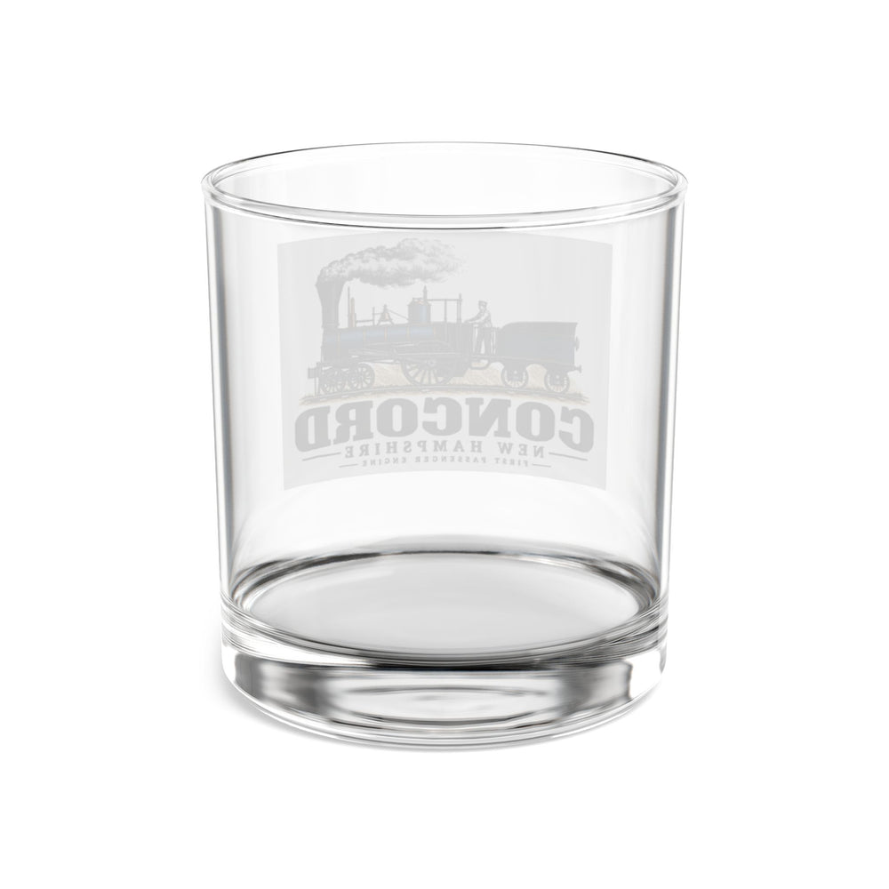 Transparent reverse with front artwork visible through glass of First Passenger Engine rocks glass, Concord, New Hampshire.
