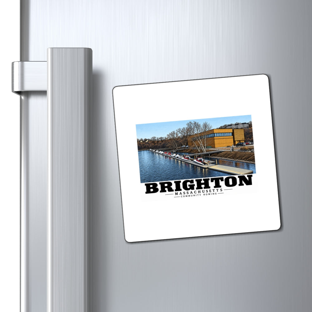 Community Rowing building, dock and boats magnet on a refrigerator beside its handle