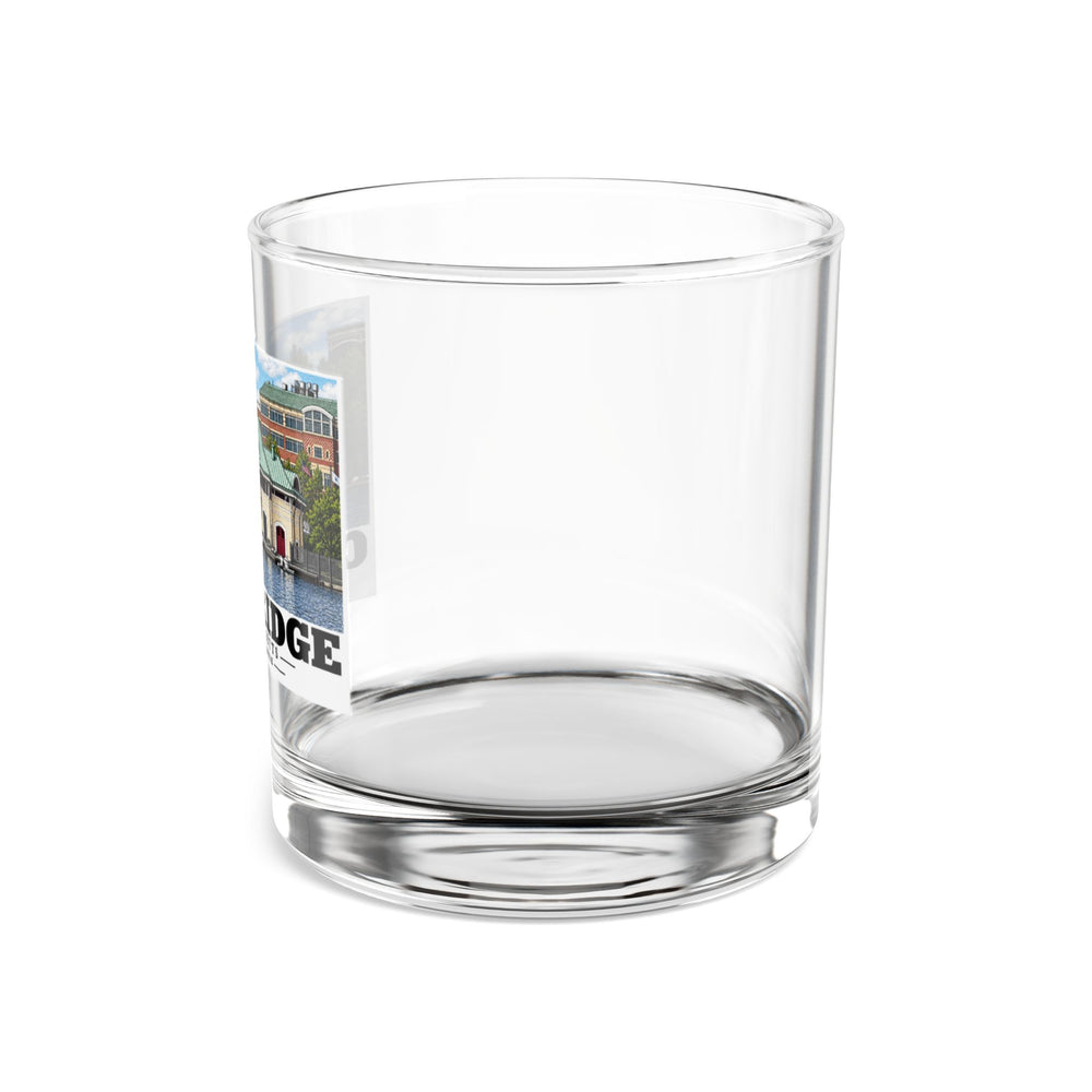 Left-side view of the clear rocks glass with DeWolfe Boathouse artwork partly visible.