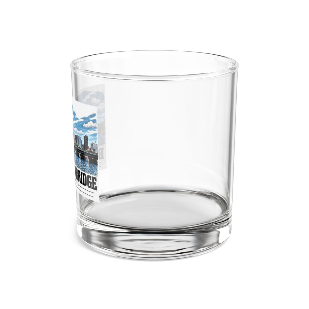 Side view of clear rocks glass with mostly unprinted surface and part of Harvard Bridge river and skyline view print at left