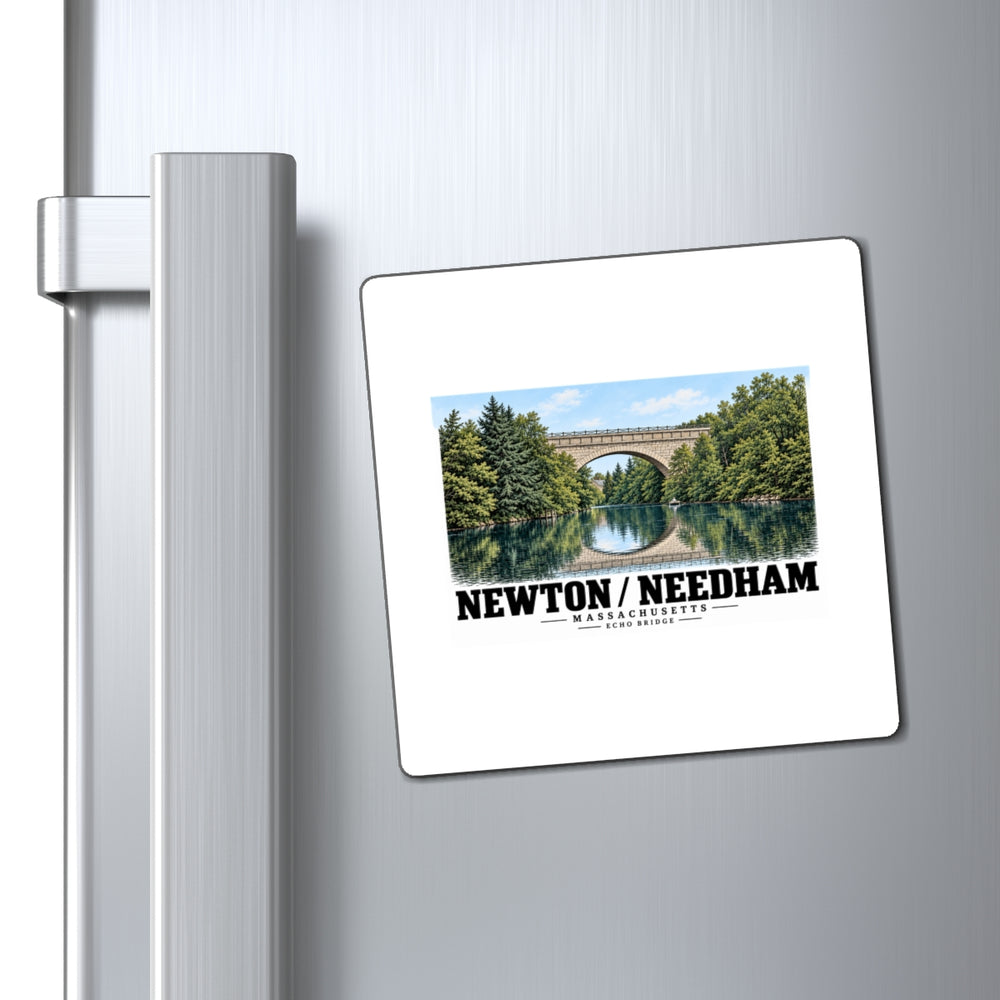 Magnet with Echo Bridge artwork and Newton/Needham lettering on a refrigerator beside the handle