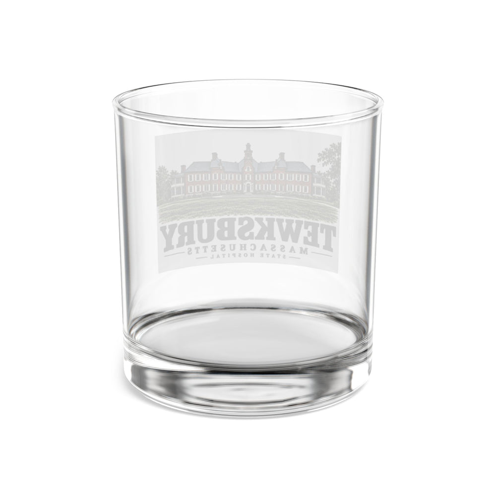 Transparent reverse with front artwork visible through glass of State Hospital rocks glass, Tewksbury, Massachusetts.