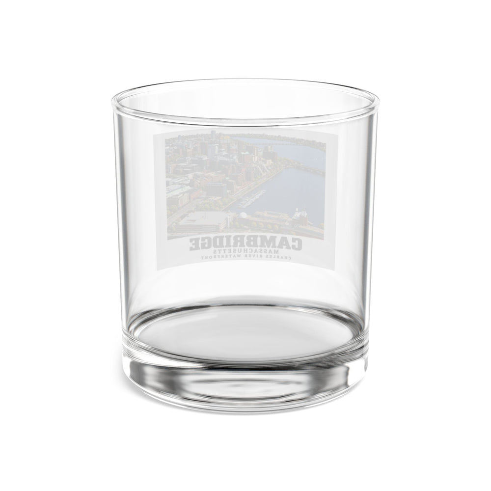 Rear view of clear rocks glass with Cambridge Charles River waterfront aerial city view print and reversed lettering visible through the glass