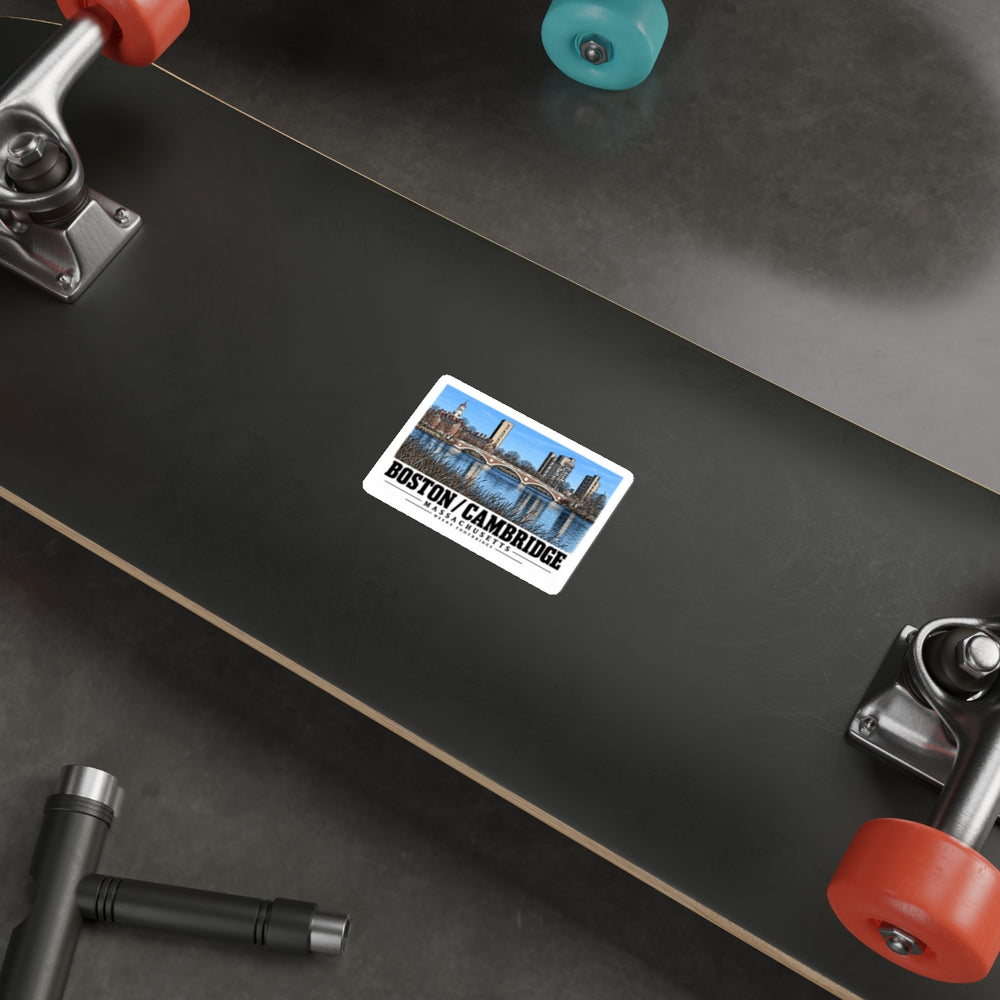 Sticker showing Weeks Footbridge stone arches and riverside towers artwork on the underside of a skateboard
