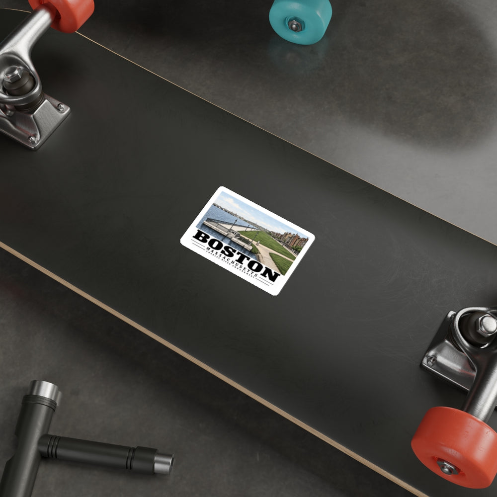 Sticker showing Charles River Embankment riverside path, lawn and buildings artwork on the underside of a skateboard