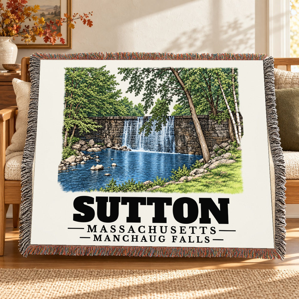 Manchaug Falls woven blanket draped on a sofa in a living room — Sutton, Massachusetts