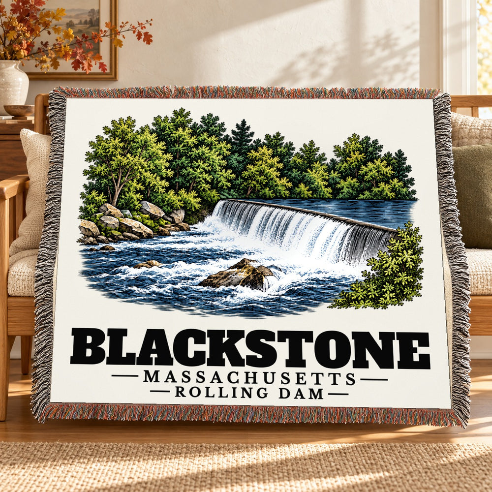 Rolling Dam woven blanket draped on a sofa in a living room — Blackstone, Massachusetts