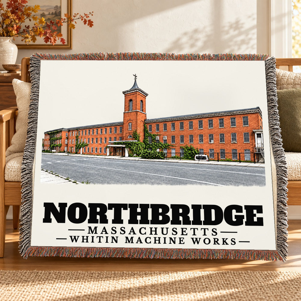 Whitin Machine Works woven blanket draped on a sofa in a living room — Northbridge, Massachusetts