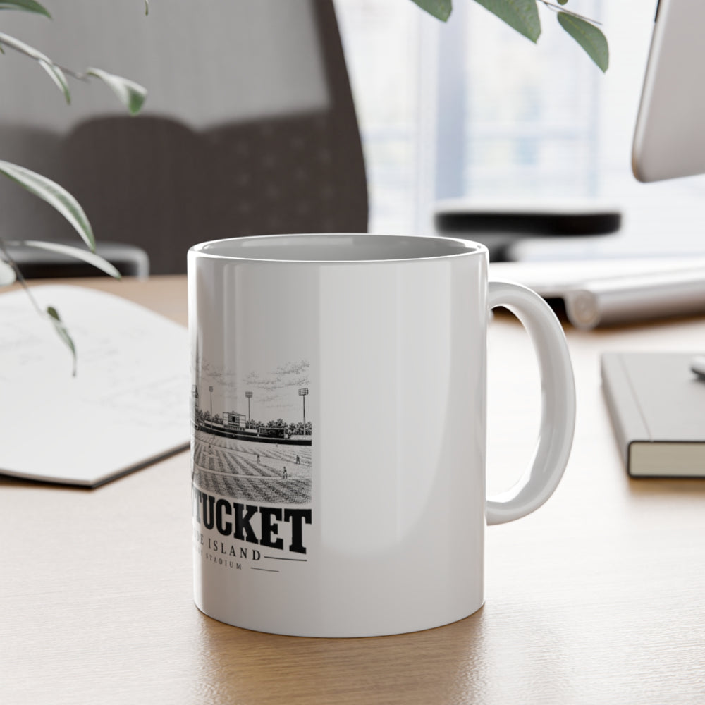 Pawtucket McCoy Stadium — White 11-ounce ceramic mug, on desk with handle visible.