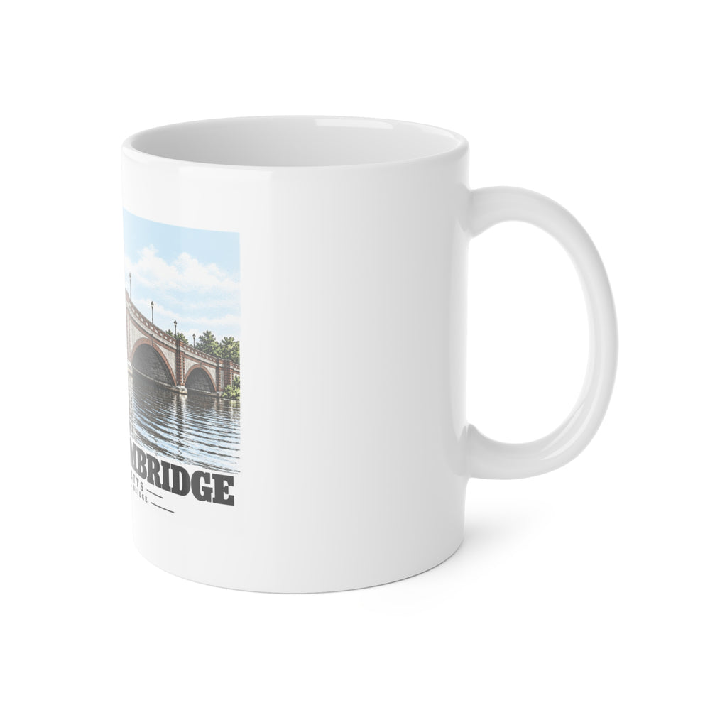 White mug with handle at right and part of the Anderson Memorial Bridge close arch view print at left