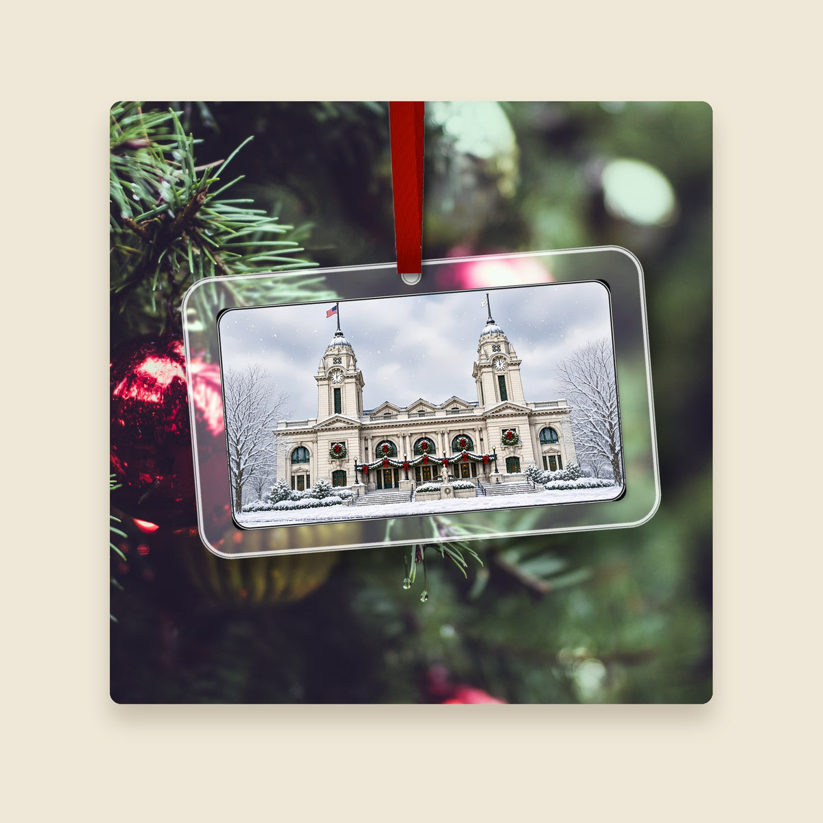 Union Station in Worcester, MA acrylic Christmas ornament hanging on a Christmas tree