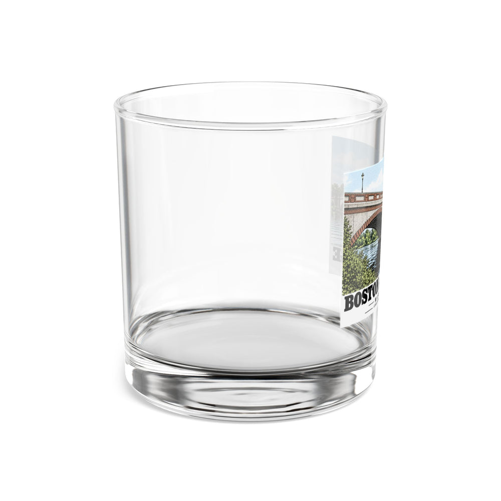 Side view of clear rocks glass with mostly unprinted surface and part of Anderson Memorial Bridge close arch view print at right