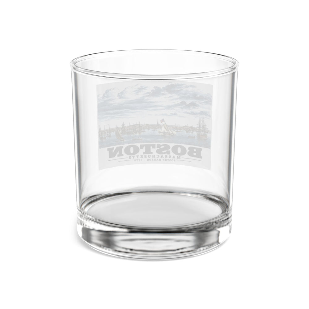 Rear view of clear rocks glass with Boston Harbor waterfront scene with sailing ships print and reversed lettering visible through the glass