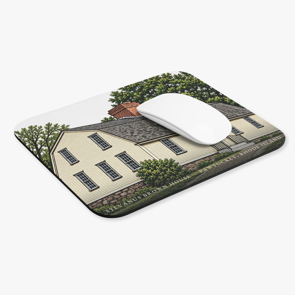 Pawtucket Sylvanus Brown House mouse pad shown on a desk with a mouse