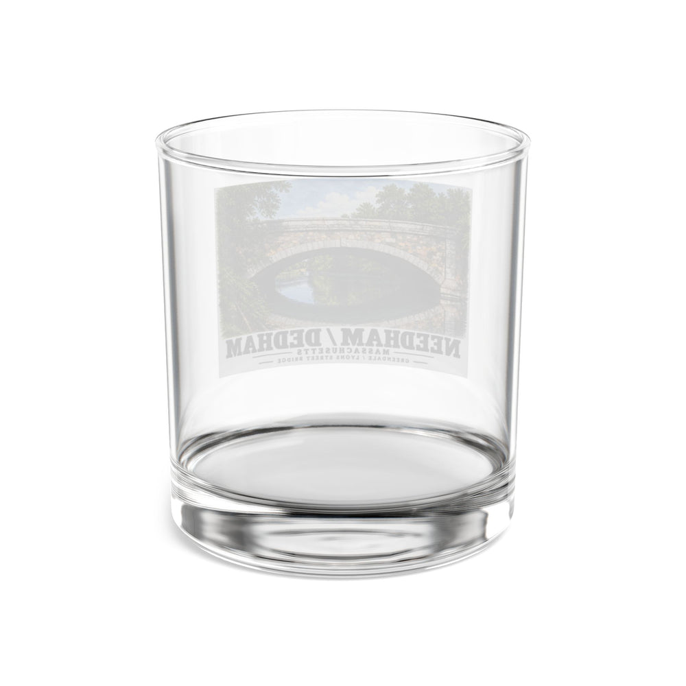 Rear view of clear rocks glass with Greendale Avenue / Lyons Street Bridge stone arch and reflection print and reversed lettering visible through the glass