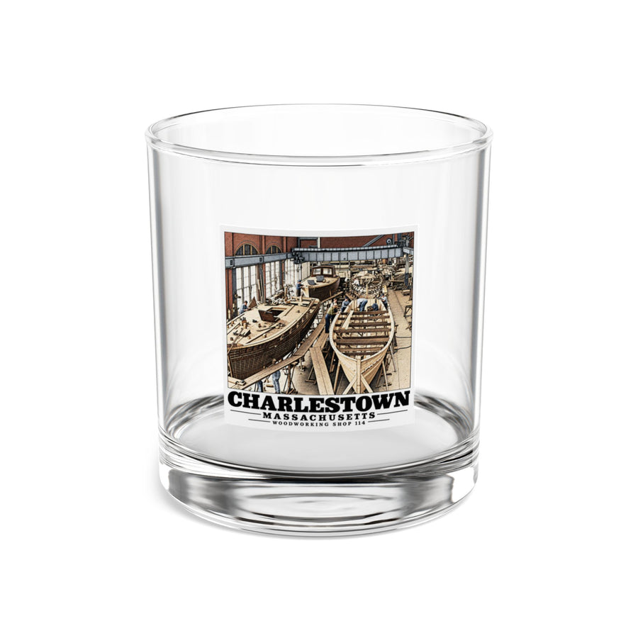 Front of clear 10 oz rocks glass with small-boat building and Charlestown artwork