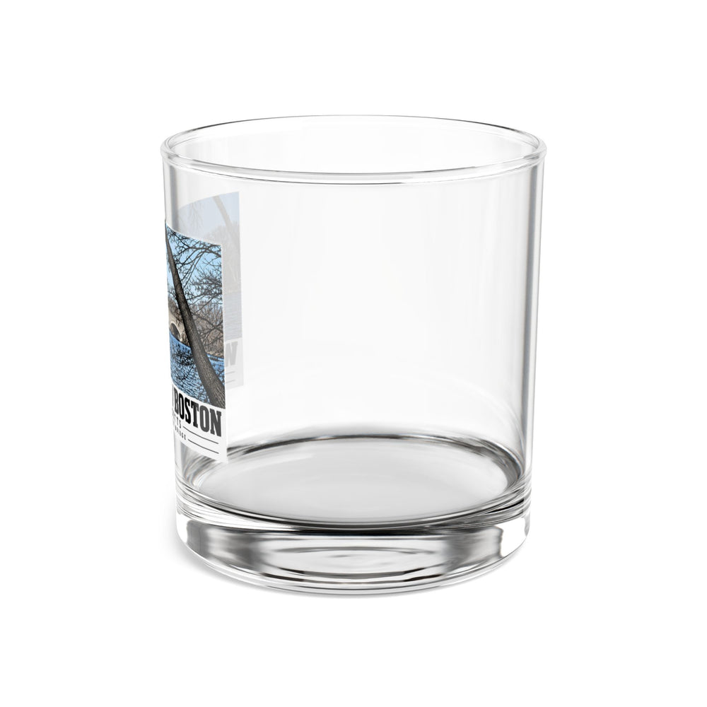 Side view of clear rocks glass with mostly unprinted surface and part of North Beacon Street Bridge stone arches framed by a bare tree print at left