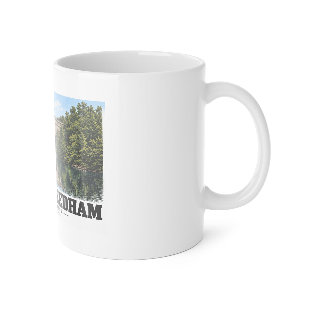 White mug with handle at right and part of the Echo Bridge landscape print at left
