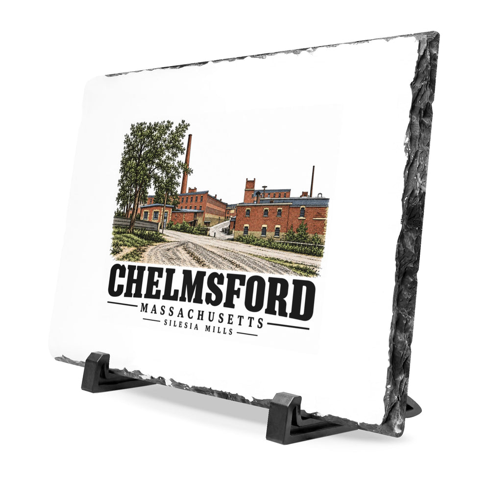 Angled front on display stands of Silesia Mills slate desk plaque, with Chelmsford, Massachusetts artwork and lettering.
