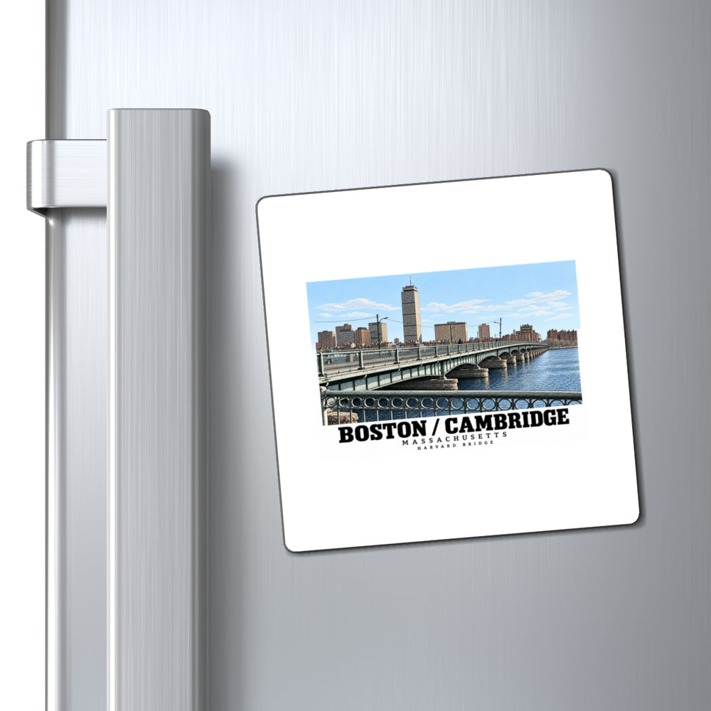 Magnet with Harvard Bridge artwork and Boston/Cambridge lettering on a refrigerator beside the handle