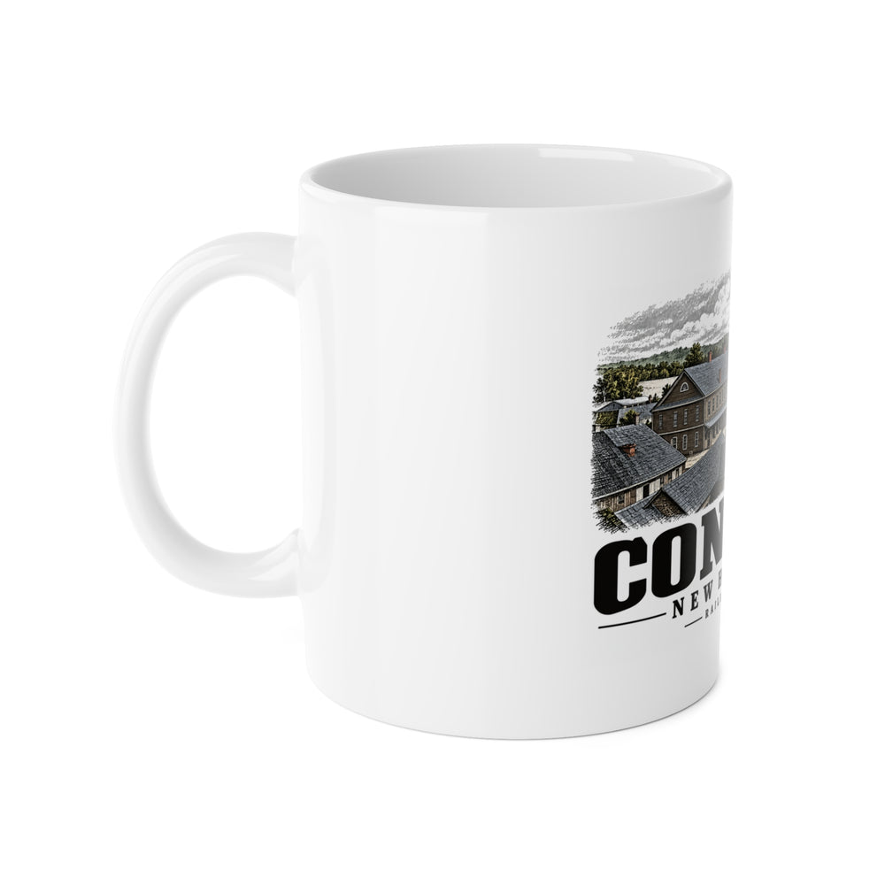 Left-handle side view of Railroad Square white ceramic mug, Concord, New Hampshire.