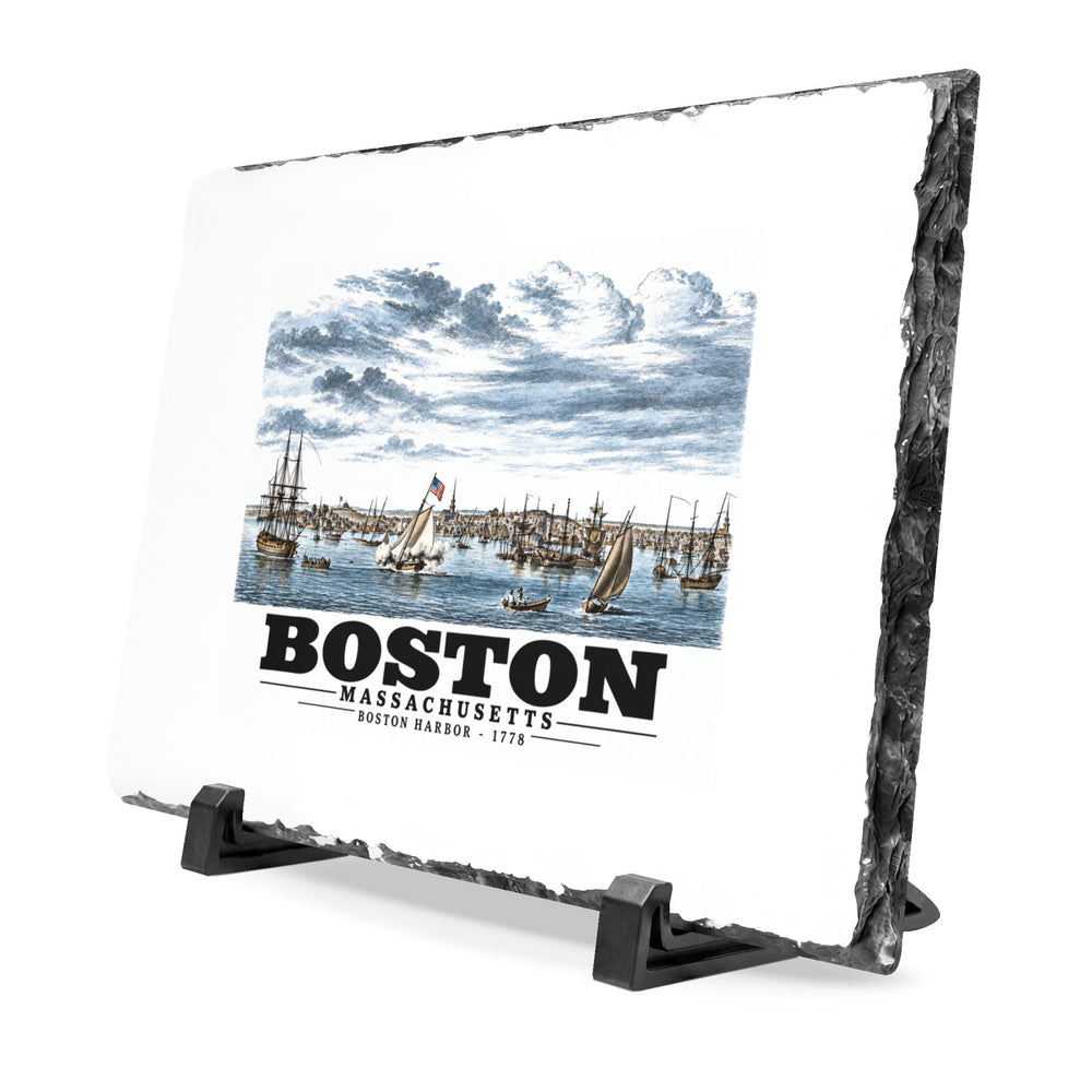 Angled rough-edged slate display on black stands showing Boston Harbor waterfront scene with sailing ships artwork