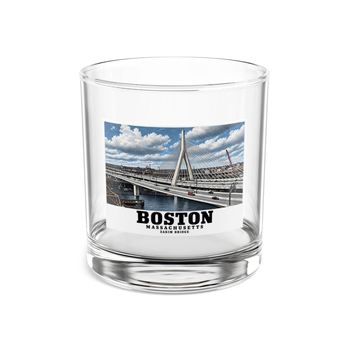 Clear rocks glass showing Zakim Bunker Hill Bridge cable-stayed towers and Charles River artwork and Boston lettering