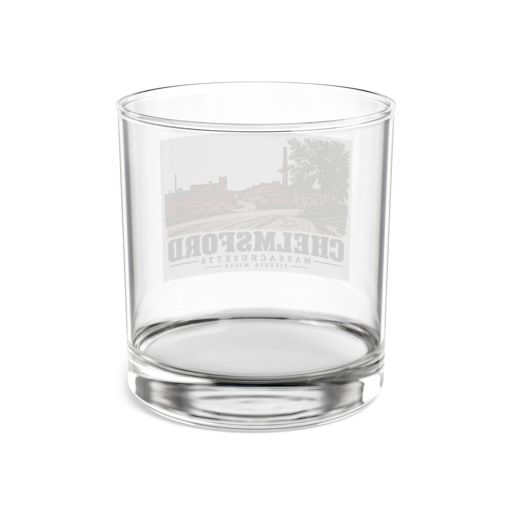 Transparent reverse of Silesia Mills rocks glass, with Chelmsford, Massachusetts artwork and lettering.